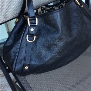 Authentic Gucci monogram leather bag